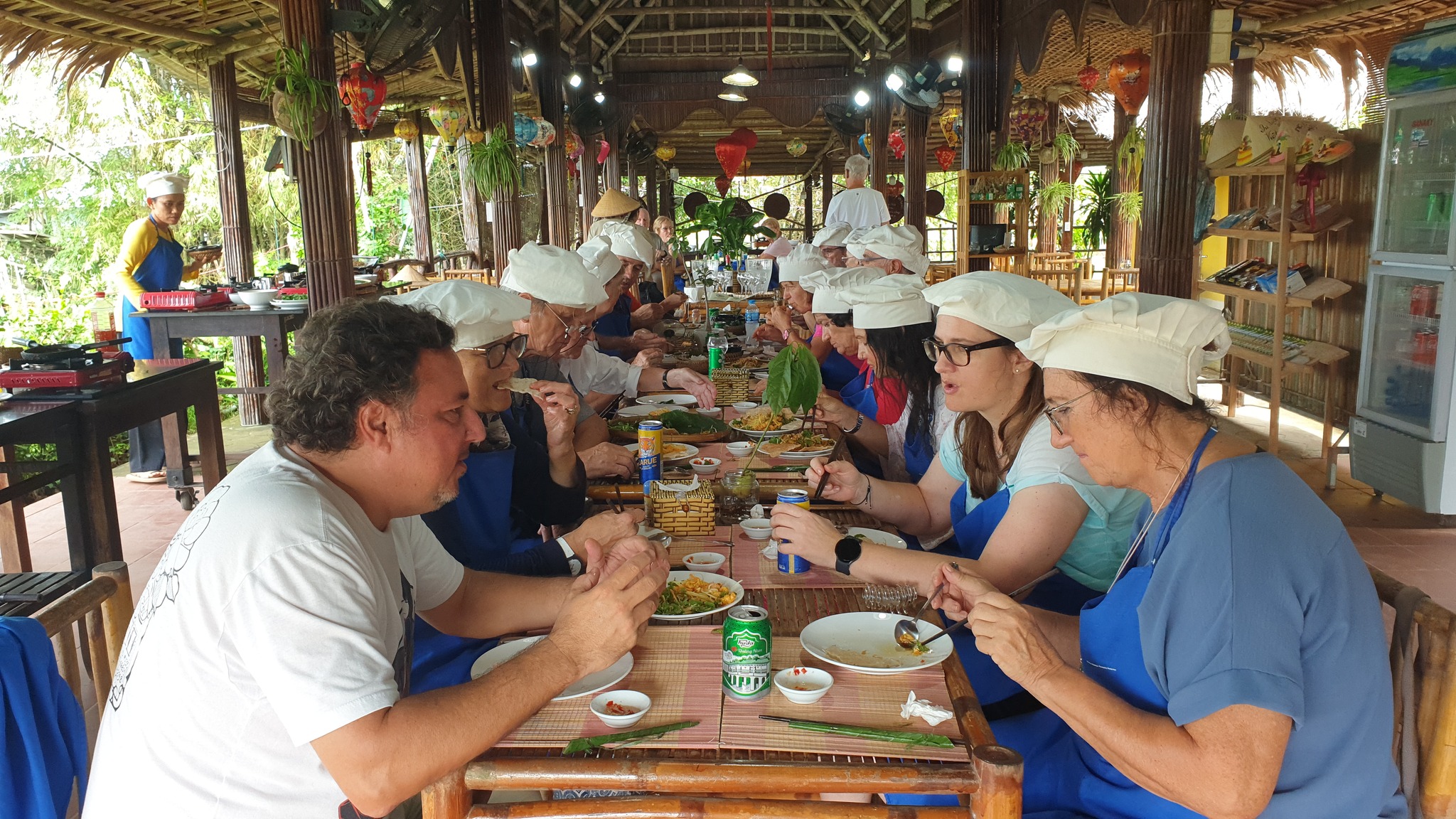 Enjoy meal at Experience Tra Que Cooking Class in Tra Que Vegetable Village © 2024 V-Explorer® All rights reserved.